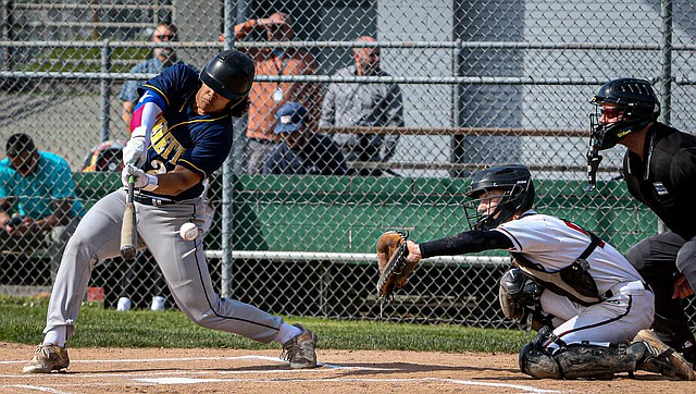 Everett Seagulls senior Luca Morales takes a big swing during the game against Snohomish on a pitch perfect afternoon at Snohomish’s ball-park April 30. Snohomish’s pitcher junior Luke Davis pitched the complete game, striking out 7, giving  up only  eight hits and a single lone run in the Panthers’ fine win over Everett 2-1.
