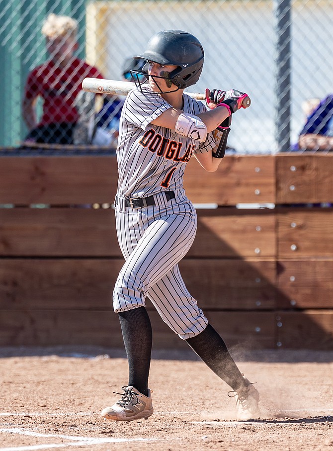 Douglas High’s Marissa McLelland lines up for a slap hit Wednesday afternoon at Spanish Springs.