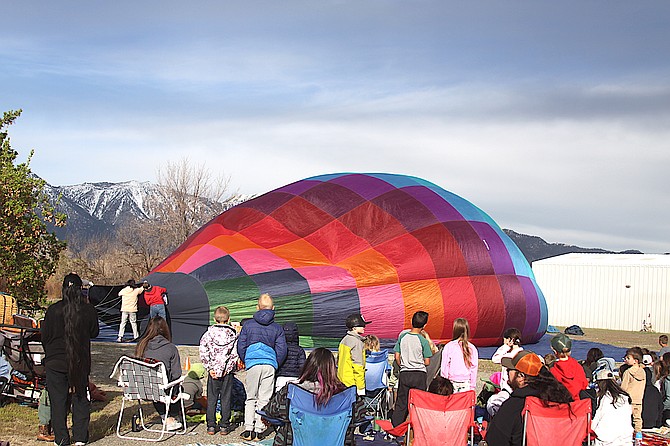Homeschool students and families in Douglas County participate during the Hot Air for Hope Carson Valley Balloon Festival’s community outreach balloon demonstration on April 11 at Balloon Nevada on Highway 395 in Gardnerville.