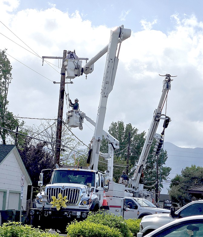 NV Energy workers replace a pole and transformer at the Minden Post Office on Monday. Photo special to The R-C by Kathy Chipman Wicker
