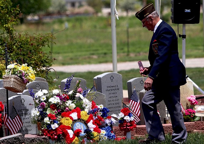 Fallon Veterans of Foreign Wars member Mike Terry participates in a previous Memorial Day ceremony at The Gardens east of Fallon.