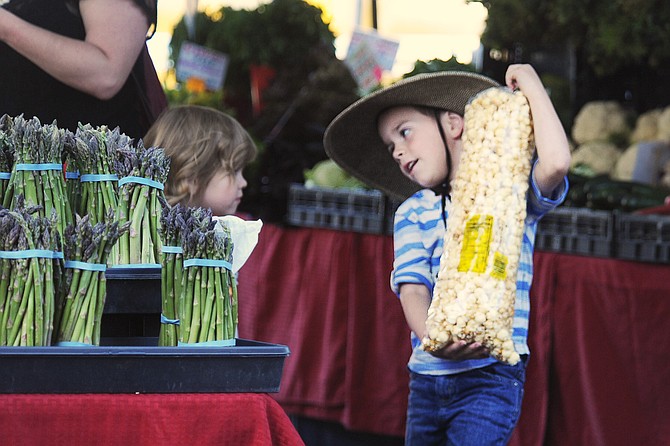 A boy and his big bag of kettle corn in 2017.