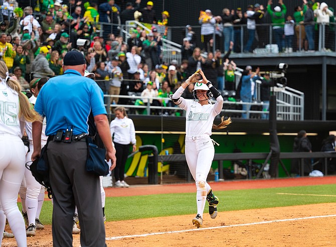 Carson High grad Kedre Luschar, shown here in action for the University of Oregon this season, was named to the division I all-American second team.