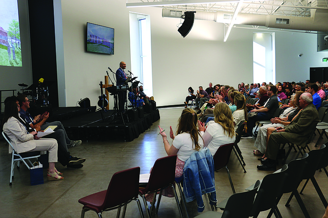 Sierra Lutheran High School head of school Pastor Micah Glenn provides opening remarks May 21 during the dedication of the Pastor Julias “Juls” Clausen Memorial Center and multipurpose hall.