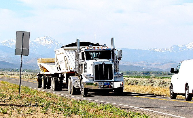 A Knox Excavation truck travels north along East Valley Road on May 20.