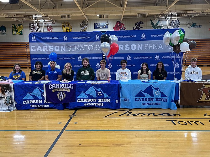 Carson High School had 11 seniors sign letters of intent to continue to play sports at the collegiate level. Pictured from left are Danika Presswood, softball, Northeast Iowa CC; Sergio Villanueva, football, Wooster College; Angelo Macias, football, University of St. Mary; London Bishop, cheer, Carroll College; Dominic Porter, wrestling, Mercyhurst University; Ewan Kalley, swimming, University of Redlands; Johan Lizarraga, soccer, Concordia College; Aurora Giurlani, cheer, University of Nevada; Alondra Carrillo, soccer, Truckee Meadows CC; Sawyer Macy, cross country and track, Lehigh University. Not pictured, Joshua Lopez, soccer, Centralia College.