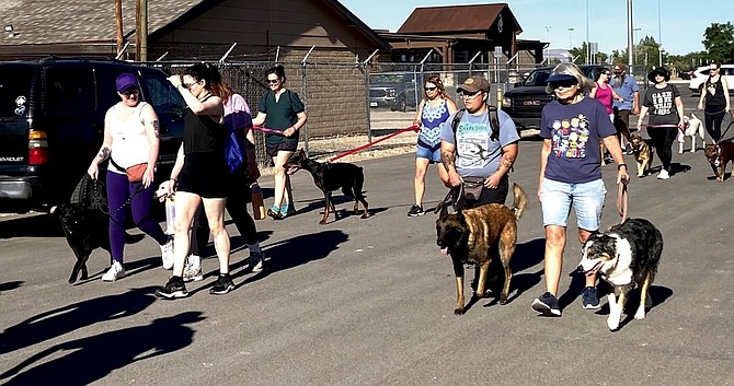 Two- and four-legged participants take off from the starting line at last year’s “Bark in the Park” 5K fun run/walk.