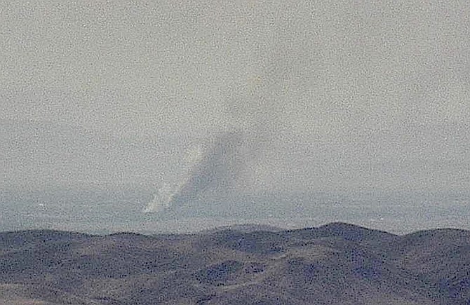 A smoke plume from the Sheckler Fire that claimed a home near Fallon from a Nevada Fire Alert Camera.