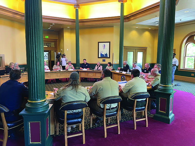 Gov. Joe Lombardo convenes a roundtable for a wildfire briefing on June 10 at the Capitol.