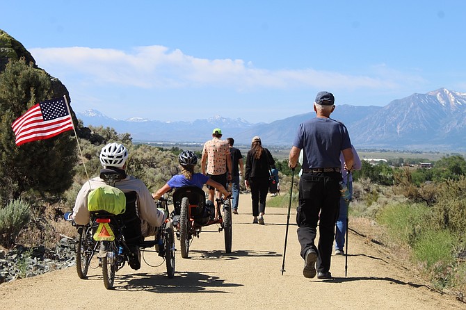 Attendees hitting the new Prison Hill West Trail in east Carson City following a ribbon-cutting on June 14.