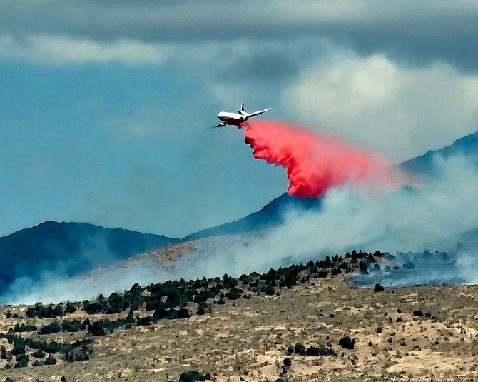 A fire tanker drops retardant on the Conner Fire.
Photo special to The R-C by Charissa MacKenzie