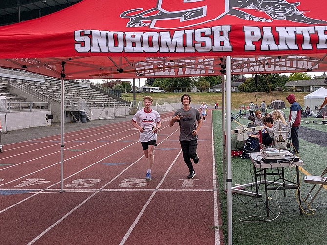 Two runners in the 2025 Panther Run.