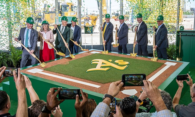 Athletics owner John Fisher, center-right, and Major League Baseball Commissioner Rob Manfred, center-left, are joined by invited dignitaries, including Gov. Joe Lombardo next to Fisher, for a ceremonial groundbreaking event at the site of the team's $1.75 billion Las Vegas baseball stadium on June 23.