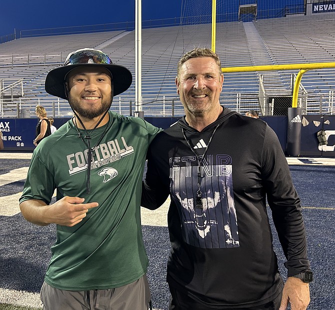 David Leach, left, stands next to Nevada football coach Jeff Choate during a summer practice. Leach is a first-year coach for Central Methodist University after growing up and playing football for Dayton and Carson High Schools.