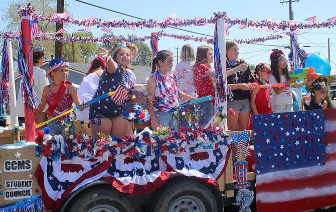 Scenes from a previous Fourth of July parade.