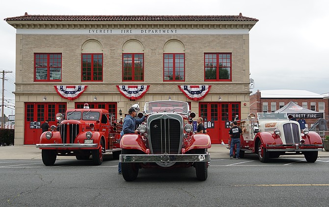 Historic firetrucks from Everett Fire Department stand polished in front of the historic HQ at 2801 Oakes Ave.
