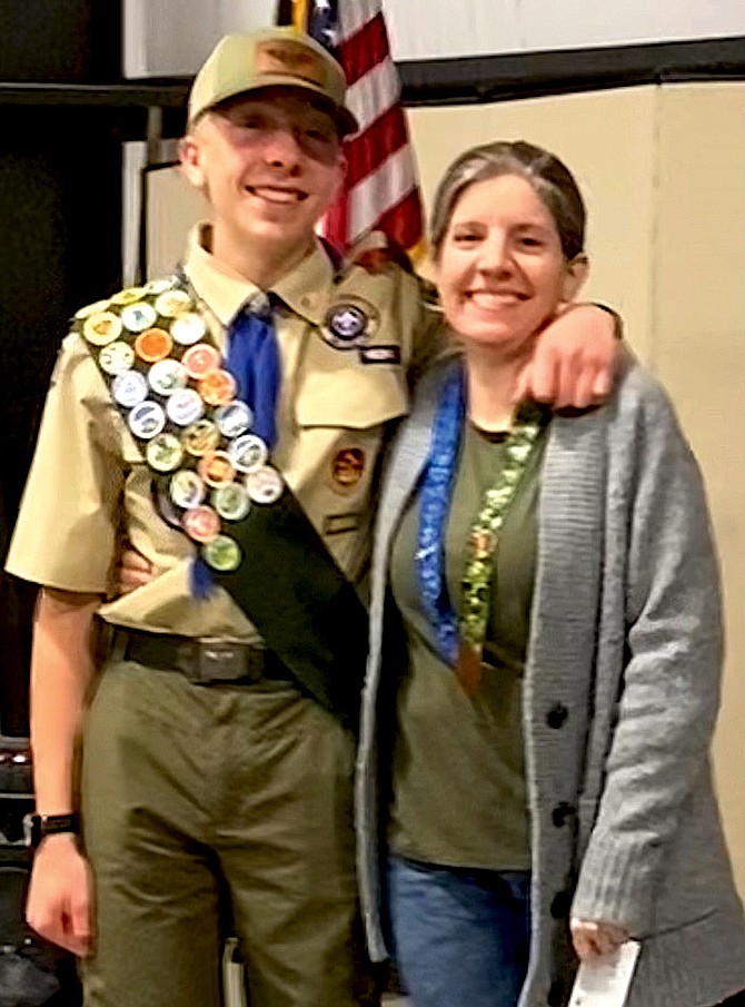 Boy Scout Benjamin Hallquist is recognized by Fallon Troop #1776 for saving his mother, Jessica, during a barbecue.