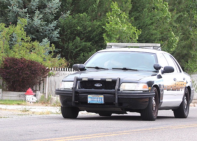 A Douglas County Sheriff's jail unit travels south down Tillman Lane on Thursday afternoon after the subject of a manhunt was taken into custody.