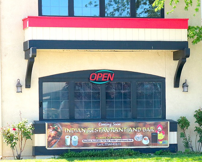 Flame of India conducted a soft opening on Monday night with a buffet and a crowd gathered by word of mouth. The restaurant is open in Gardnerville now.