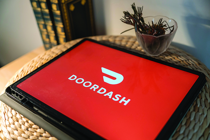 DoorDash is raising its service fees in Seattle — again — due to the city’s laws for app-based workers.