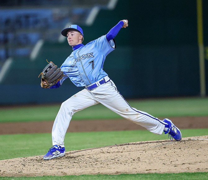 Noah Hutchison fires a pitch Tuesday night at Greater Nevada Field. Hutchison tossed 6.1 innings with five strikeouts to help the Senators’ get their first win over Douglas since 2021.