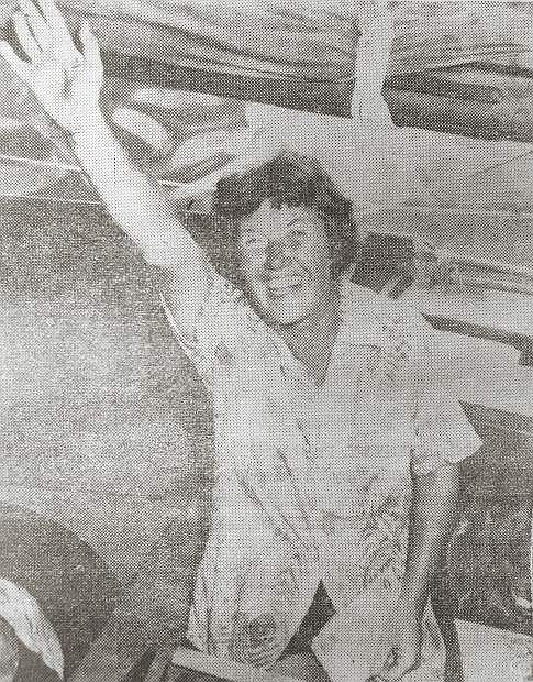 COMPLETING FIRST CROSSING of the Atlantic by lone woman, Mrs. Ann Davison, 38, waves happily to crowds at Miami, Fla. The Englishwoman sailed the ocean in a 23-foot sailboat.