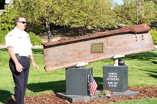 Carson City Fire Chief Stacey Giomi speaks at the 9/11 memorial service Thursday at Mills Park.