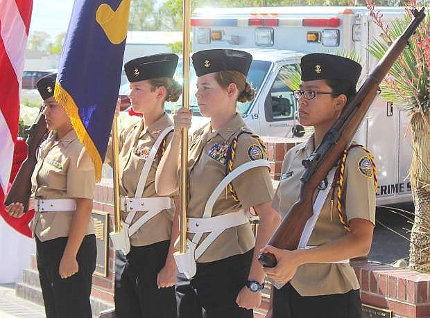 From the left: the Churchill County High School ROTC&#039;s Elba Gonzalez, Fallon Hughes, Savannah Hughes and Stephanie Thelianos present arms and carry the flag.