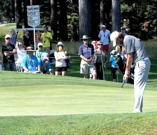Former professional tennis player Mardy Fish putts during the first round of the American Century Championship on Friday.