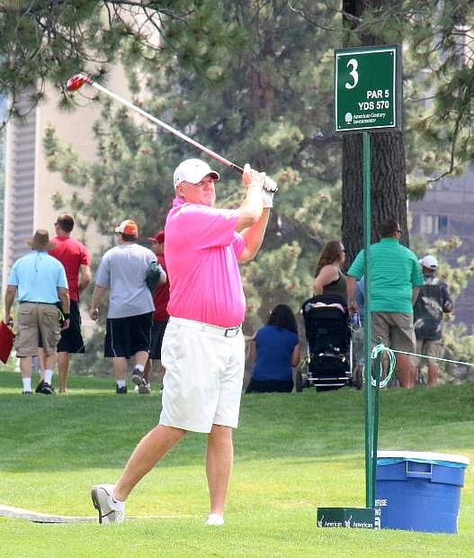 Former National Football League quarterback Billy Joe Tolliver tees off during Wednesday&#039;s Lake Tahoe Celebrity-Am Tournament at Edgewood Tahoe Golf Course.