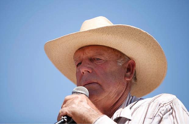 Rancher Cliven Bundy speaks at a news conference near Bunkerville, Nev., Thursday, April 24, 2014. Bundy, a Nevada rancher who became a conservative folk hero for standing up to the government in a fight over grazing rights, lost some of his staunch defenders Thursday after wondering aloud whether blacks might have had it better under slavery. (AP Photo/Las Vegas Review-Journal, John Locher)