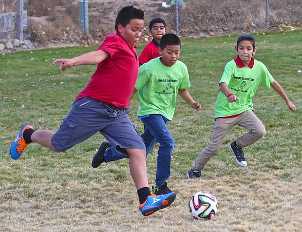 Andrik Perez pushes the ball downfield at Empire Elementary on Friday.