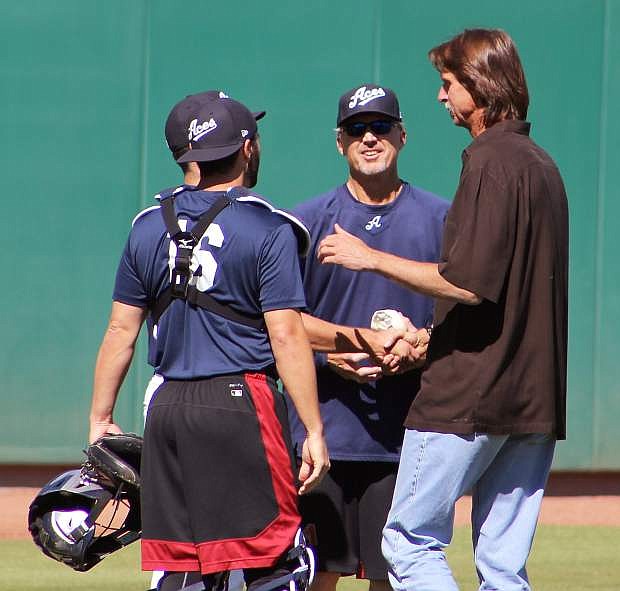 Randy Johnson meets with some of the Reno Aces before throwing out the ceremonial first pitch before Friday&#039;s home opener.