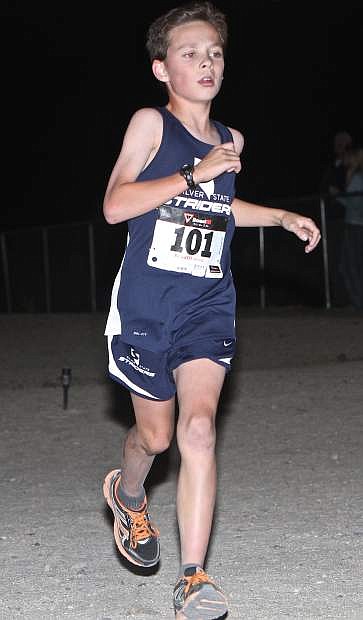 10-year-old Sean Andrews finishes the 5k in a time of 22:52 Saturday evening.