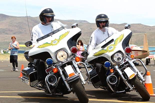 Carson City Sheriff Motor Officers Gary Denham and Joey Trotter demonstrate their skills at the Carson City Airport open house Saturday.