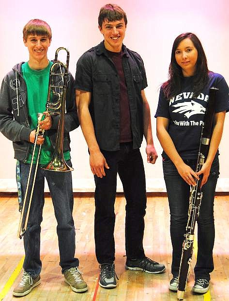 Justin Olson and Debra Beyer made the All-State Band list after a 17 year dry spell for Churchill County High School. Joseph Sorensen not only made All-State Choir but was also chosen for section leader for the Bass I. From left are Olson, Sorensen and Beyer.