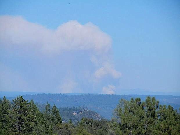 The American Fire emits a plume of smoke on Monday afternoon visible from Interstate 80 about a half hour or so west of Truckee.