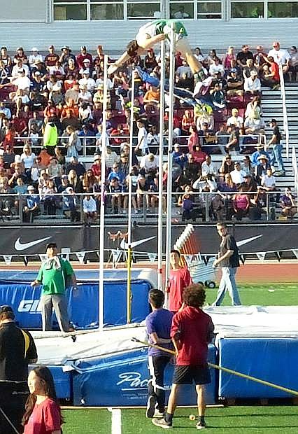Fallon senior Nathan Heck clears the bar during the Arcadia Invitational on Saturday near Los Angeles. Heck broke the school record with a height of 15 feet, 1 inch.