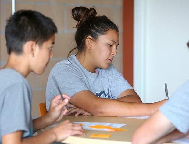 Boys and Girls Club member Natalie Ontiveros, 15, takes notes during the club&#039;s New Entrepreneurship Network on Monday.