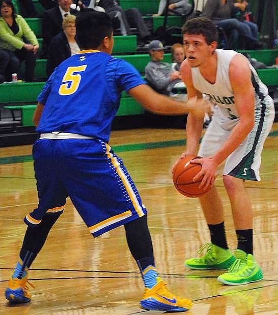 Fallon center Braxton Hunter looks to dirve the lane during the Greenwave&#039;s 68-47 win over South Tahoe on Saturday at the Elmo Dericco Gym.