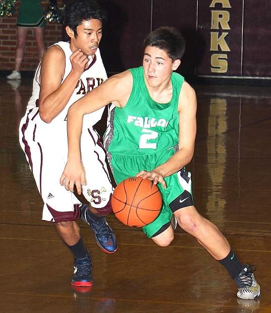Fallon&#039;s Connor Richardson pushes the ball up the floor against Sparks in Friday&#039;s 59-55 win.