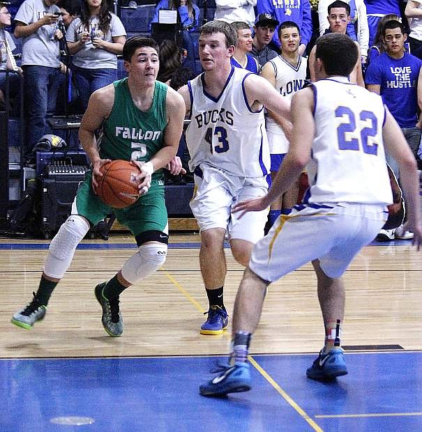 Fallon guard Connor Richardson drives the lane during Saturday&#039;s 60-23 loss to Lowry, The Wave rebounded Monday with an 84-47 thumping over Dayton.