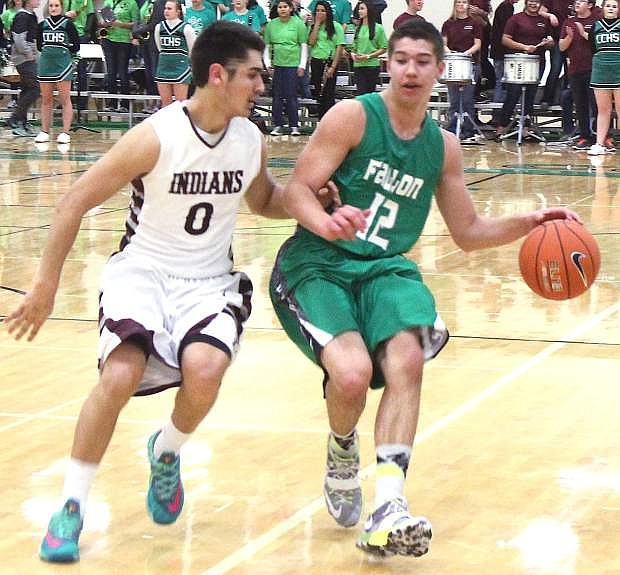Wave guard Dylan Ridenour pulls up during Fallon&#039;s 66-43 loss to Elko on Friday.