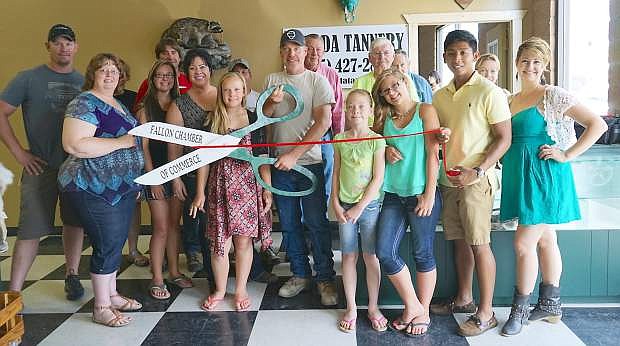 Owners Jared and Angela Mesloh and family and friends attended the recent ribbon cutting for Nevada Tannery. Chamber of Commerec members attending the ceremony included Cindy McGarrah, Chamber secretary; John Tewell, Chamber ambassador; Paolo Narag, Chamber ambassador chair; and Natalie Parrish, Chamber executive director.