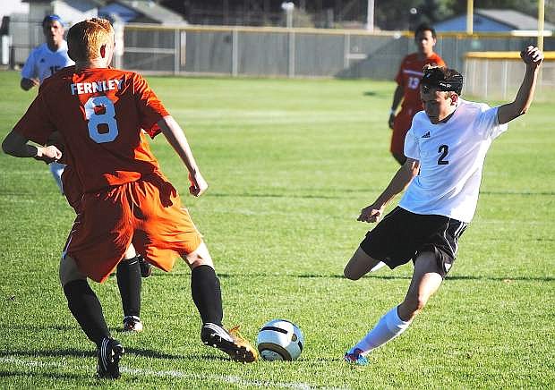 Fallon&#039;s Tristan Parrott challenges a Fernley defender for the ball during a match this season.