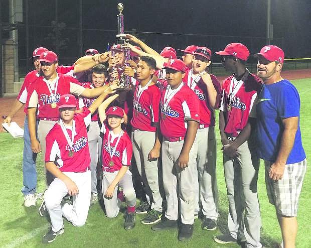 The Fallon Phillies, one of three Fallon teams in the Babe Ruthe baseball league, pose for a photo after winning the inner-league championship.