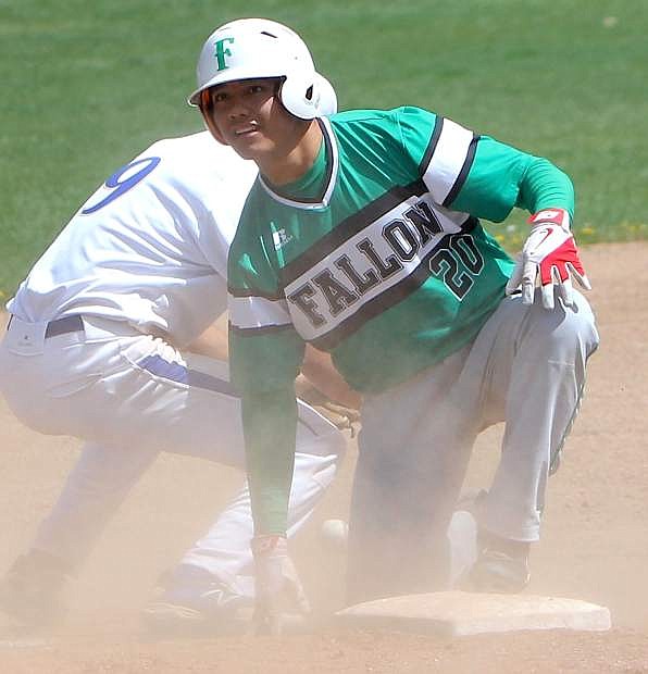 Fallon&#039;s Michael Porras slides into the bag during Fallon&#039;s series at South Tahoe last weekend. The Greenwave won two of three games and clinched the Northern Division I-A title.