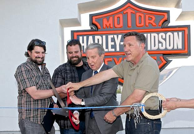 The Hohl brothers along with Carson City Mayor Bob Crowell and Assemblyman P.K. O&#039;Neill cut the ribbon at Battle Born Harley-Davidson&#039;s grand opening Thursday. Battle Born is hosting Street Vibrations participants featuring the Cash Only band from 3-6 pm today and live music from 3-7 p.m. with Thee Orbiters on Saturday.