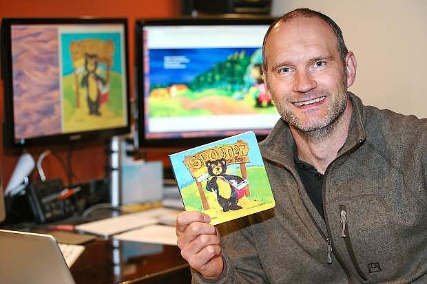Children&#039;s author Jake Willers talks about his book &quot;Spooner the Bear&quot; at his home office in Washoe Valley. Willers will read the book and meet families during a free reception at 1 p.m. Saturday. at the Browser&#039;s Corner Bookstore.
