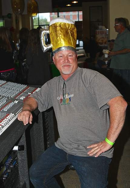 Clarity Sound&#039;s Dave Swearingen models a beer mug hat Saturday night at the Rotary&#039;s Beer and Pizza Championships at the Carson Mall.